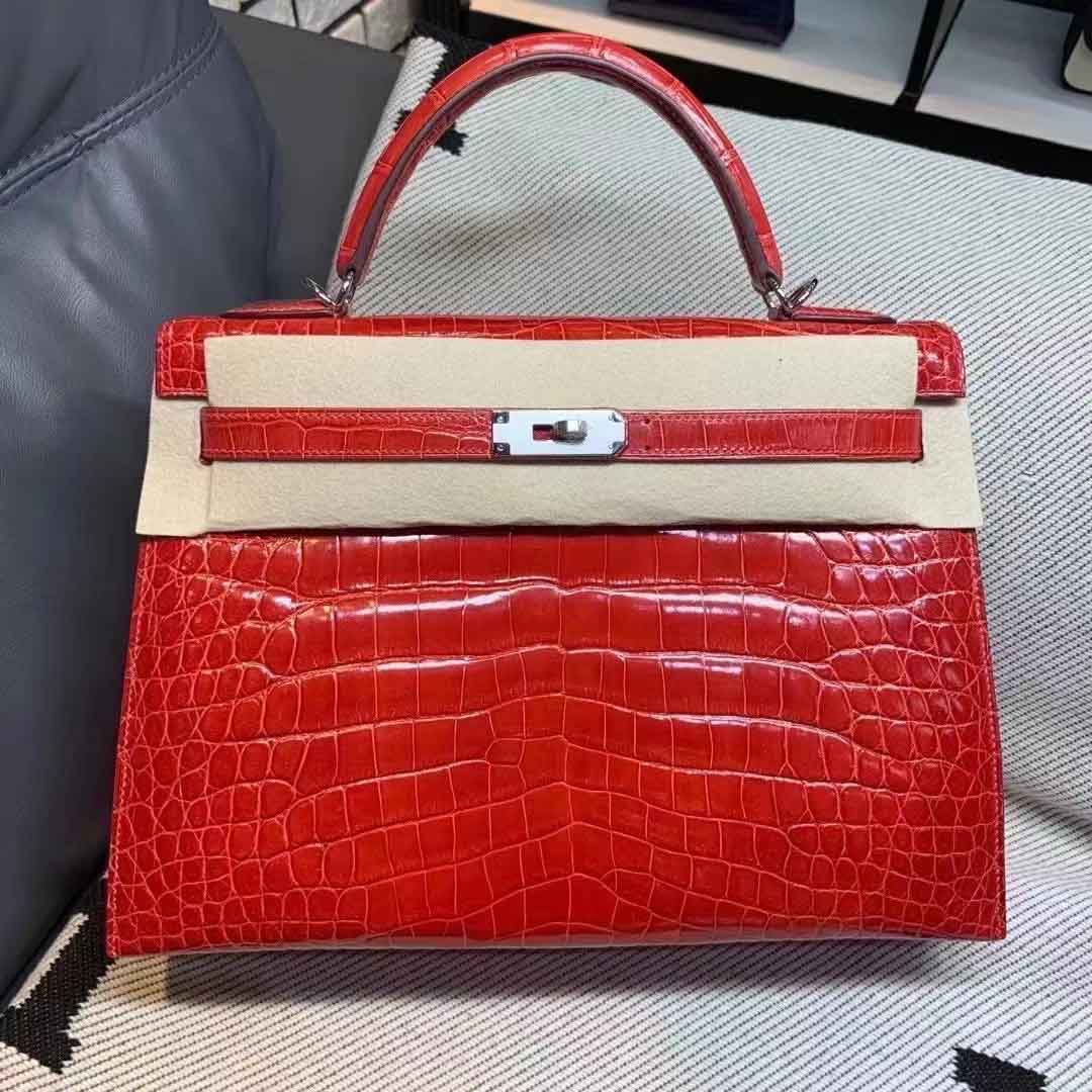 法拉利红亮面鳄鱼皮女包